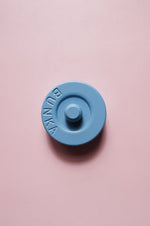 round fabric weights with bunka logo haze blue